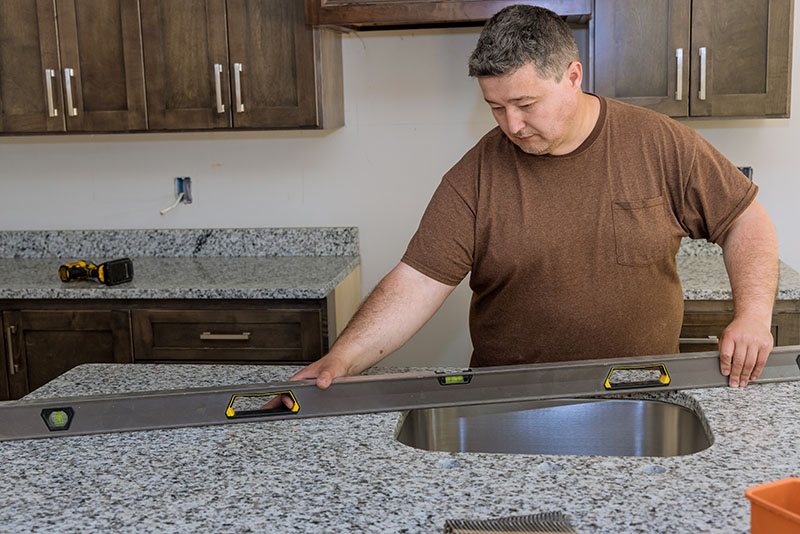 Quartz countertop installation featuring a modern kitchen design.